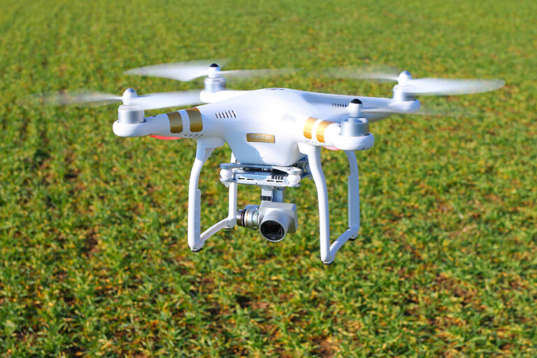 DJI Phantom drone scanning a crop field